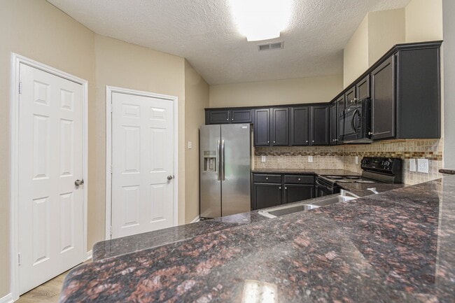 Building Photo - 9523 Tallow Tree Dr