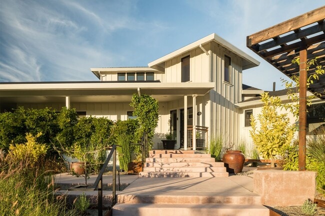 Building Photo - PURE Property Management Presents