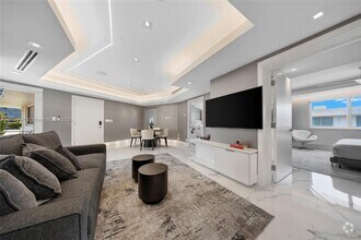 Building Photo - 10190 Collins Ave