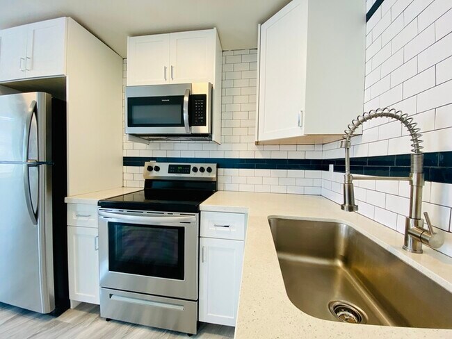 Building Photo - Modern living in this completely remodeled...