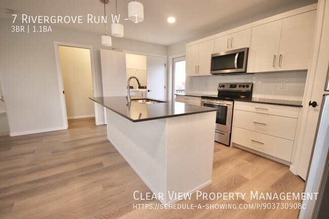 Photo du bâtiment - Beautiful 3 bedroom townhouse in Riverstone!
