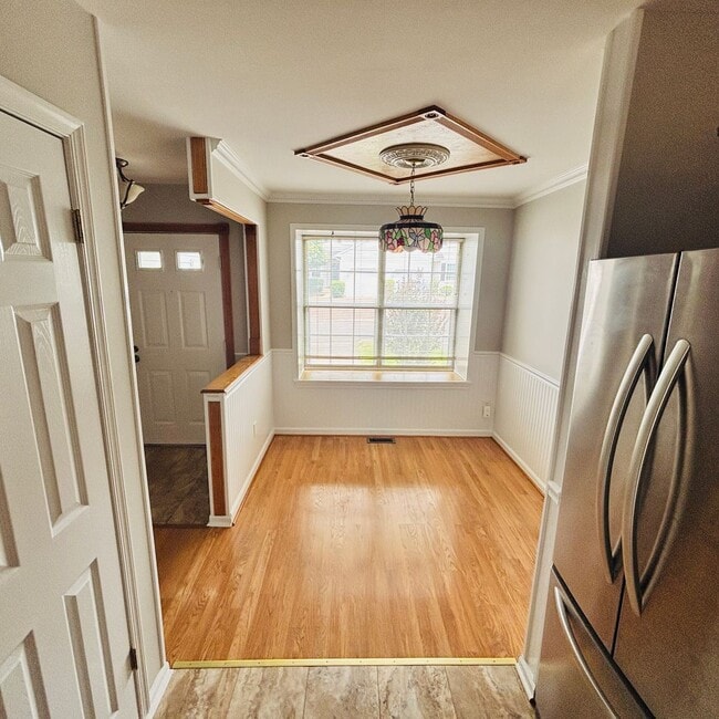 Building Photo - Spacious 3-Bedroom, 3-Bathroom Townhome with Finished Basement, Garage & Fenced Yard