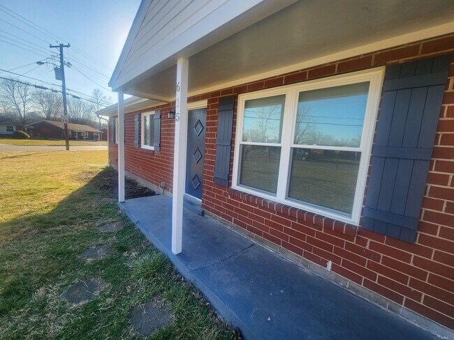 Building Photo - Spacious home on a corner lot with a large...