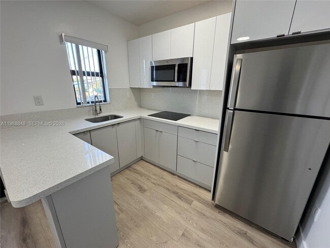 Building Photo - 1971 NW 2nd Ct