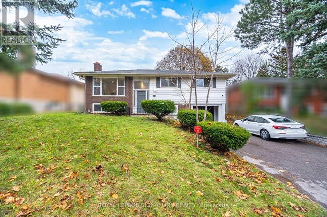 Building Photo - 406 Tamarack Dr