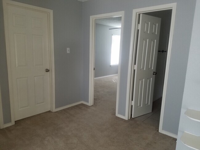 Upstairs loft, two bedrooms, full bath, and laundry room - 8808 Mystic Trail