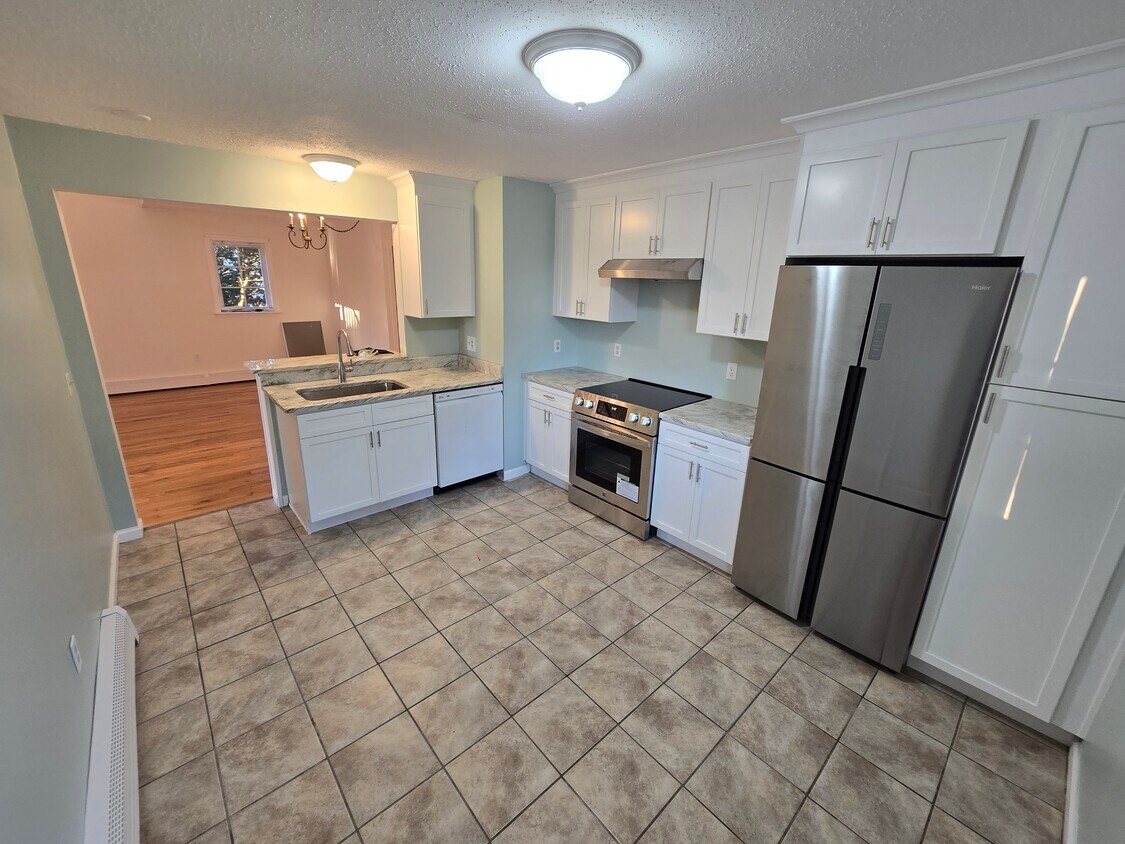 New range, new cabinets, new sink, new countertops - 133 Mitchell St