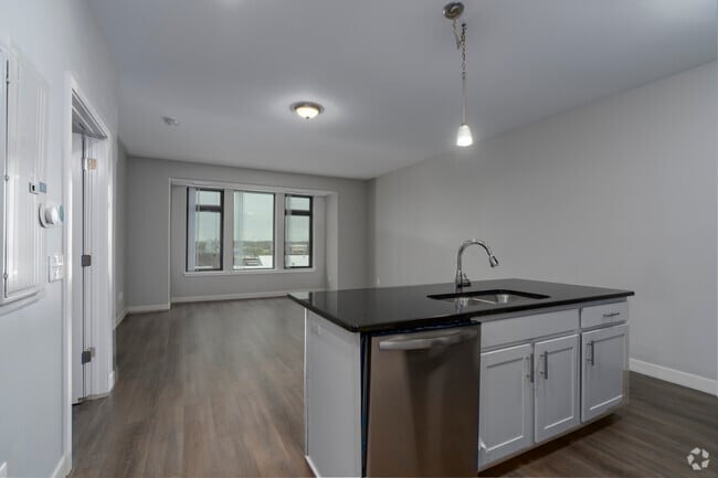 1BR, 1BA - 780SF - Kitchen/Dining/Living Room - Lofts on Louis