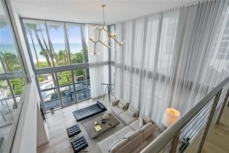 Building Photo - 6899 Collins Ave