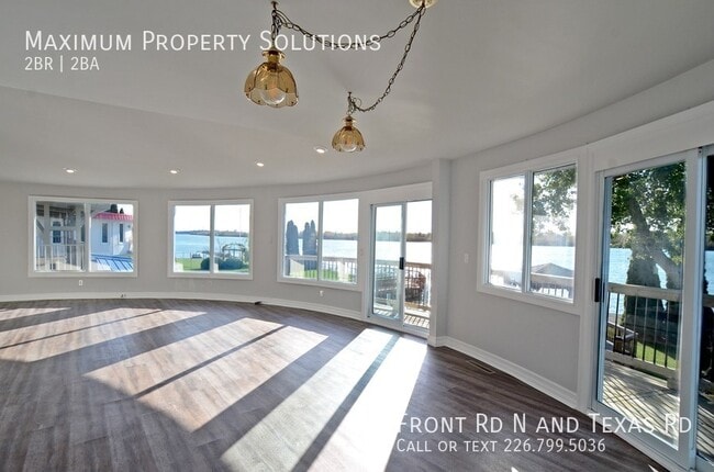 Building Photo - ALL INCLUSIVE! Stunning Waterfront Home