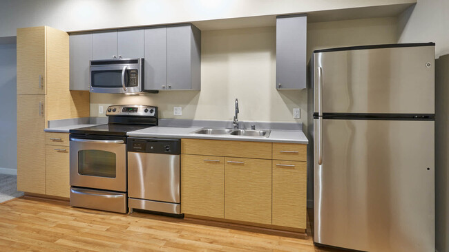 Kitchen with Stainless Steel Appliances - Riverpark