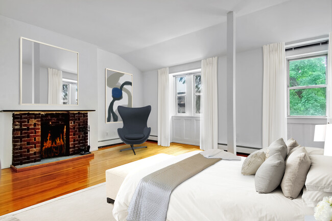 Apt. 2 - Bedroom & Fireplace (computer staged) - 413 W 154th St