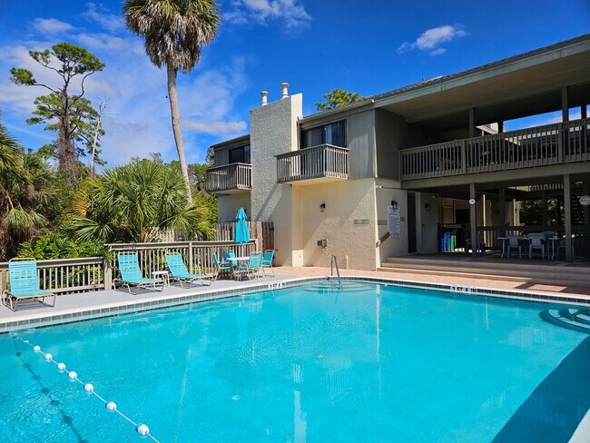 Building Photo - Annual Unfurnished 2nd Floor Condo located...