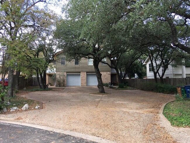 Shady driveway in a great neighborhood. - 8604 Willowick Drive
