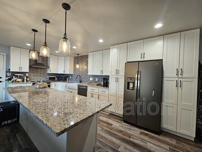 Building Photo - 5789 W 64th Ave