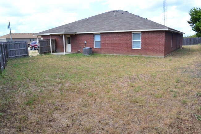 6-foot privacy fenced-in backyard - 220 Ryan Cir Apt B