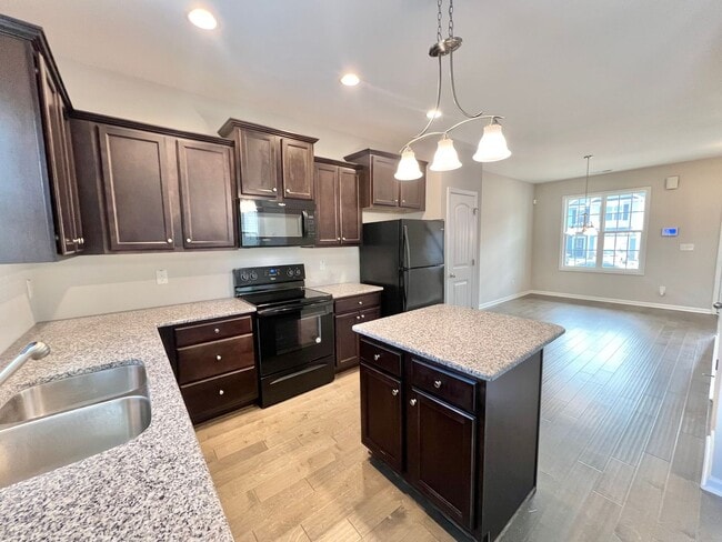 Building Photo - Lovely 4BD, 2.5BA Clayton Home with 1-Car Garage in a Great Location