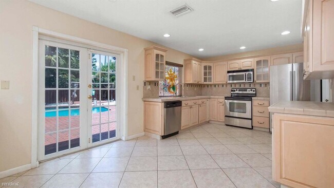 Foto del edificio - 4 br, 2 bath House - 1330 NW 94th Ter