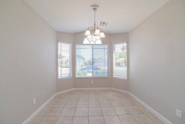 Building Photo - 8808 W Adam Ave