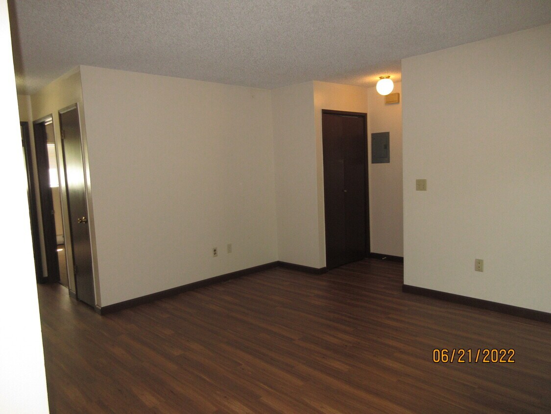 entry, living room, closet, new flooring - 1611 W 6th Ave