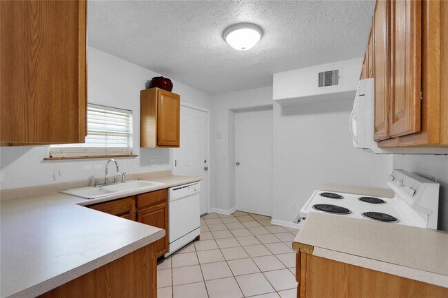 Foto del edificio - 5239 Spring Stuebner Rd