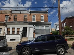 Building Photo - 6139 Larchwood Ave