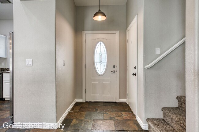 Building Photo - 4 br, 3 bath House - 7721 Whispering River...