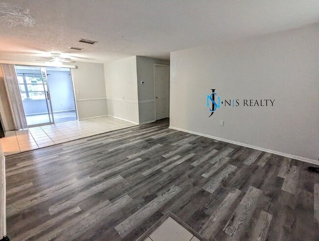 Building Photo - NEW FLOORS, NEW PAINT INSIDE & OUT.. 2/1/1...