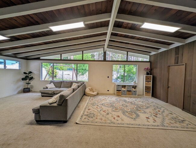 Photo - Country living in the City - Huge bonus room, entertainment deck, covered lanai and lots of storage. House