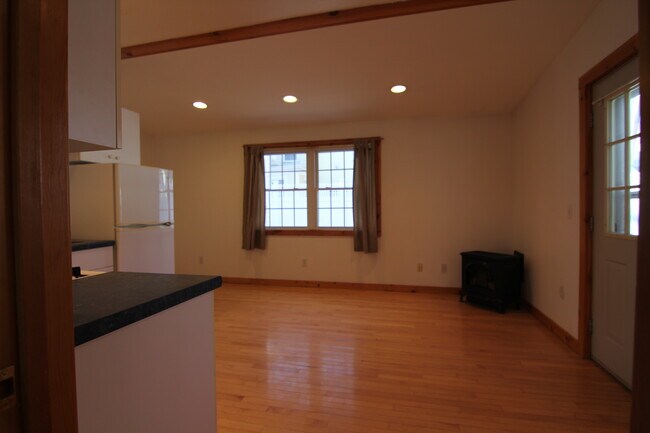 Looking from bedroom into open concept kitchen/living room - 37 Court St