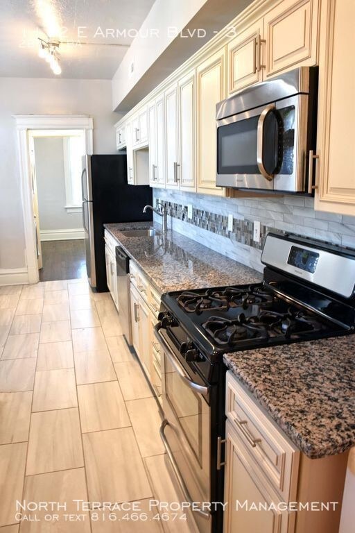 Building Photo - 1112 E Armour Blvd - 3 - 2 beds, 1 full bath
