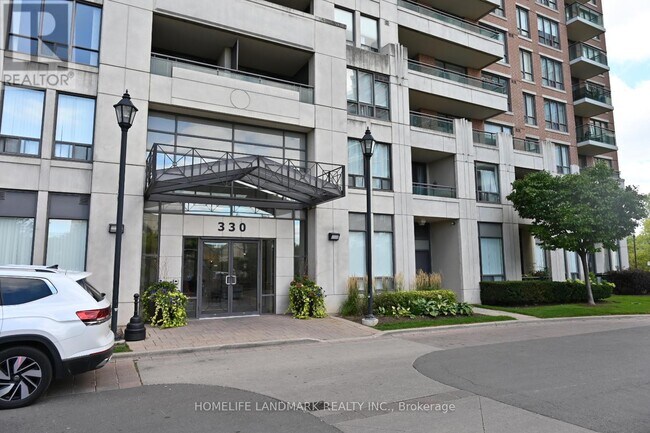 Photo du bâtiment - 330-330 Red Maple Rd