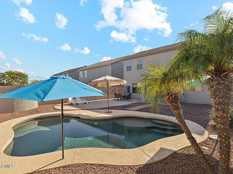 Foto del edificio - "Spacious 4-Bed Oasis with Pool on East Goldmine Court – 2,425 Sq Ft of Comfort!"