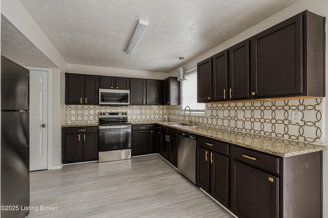 Foto del edificio - 9505 River Trail Dr