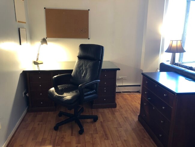 Executive working desk and comfy leather chair to get some work done! - 8200 E Jefferson Ave