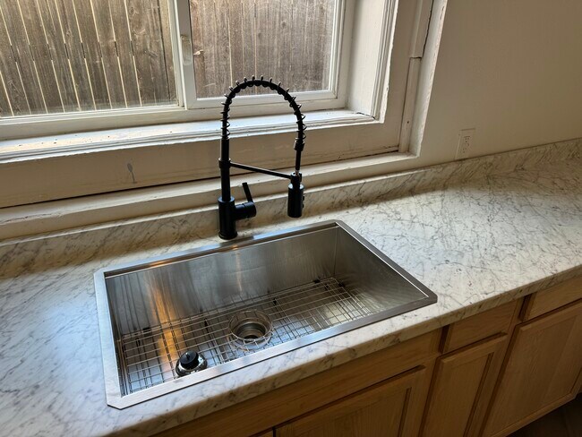 Beautiful deep sink with flexible faucet - 1718 E Abriendo Ave
