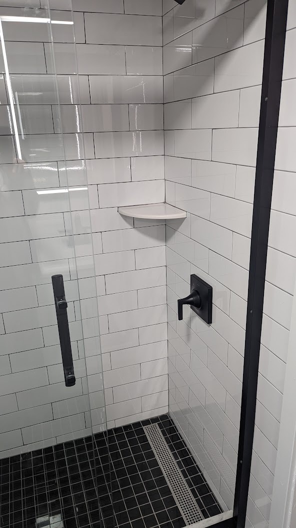 Glass Shower door with modern matte black fixtures - 2145 Browning St