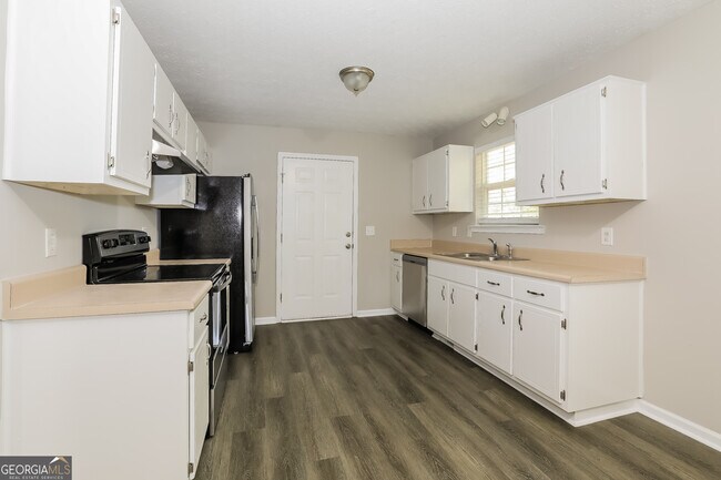Foto del edificio - 6530 River Hill Dr