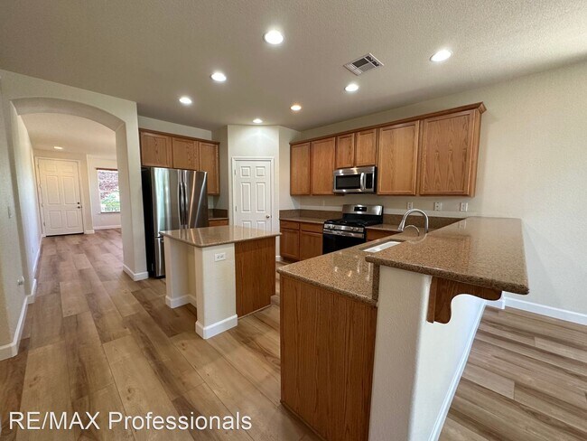 Building Photo - 4 br, 2.5 bath House - 6969 Jermann Court