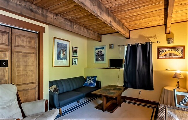 Living Room area with 55" TV - 3000 Big Mountain Rd