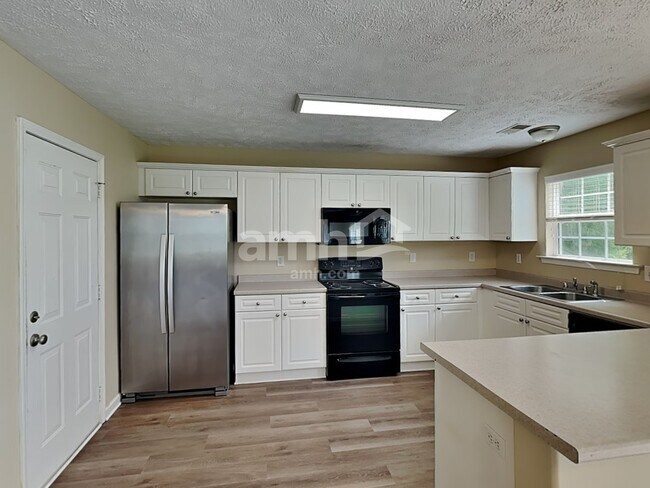 Building Photo - 4241 Sandstone Dr