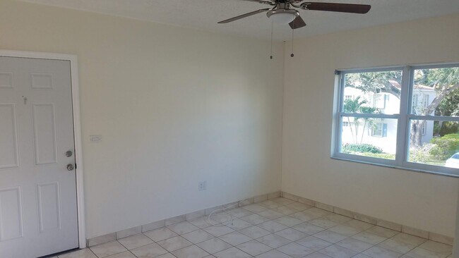 Living Room - 3762 SW 27th St Apartments