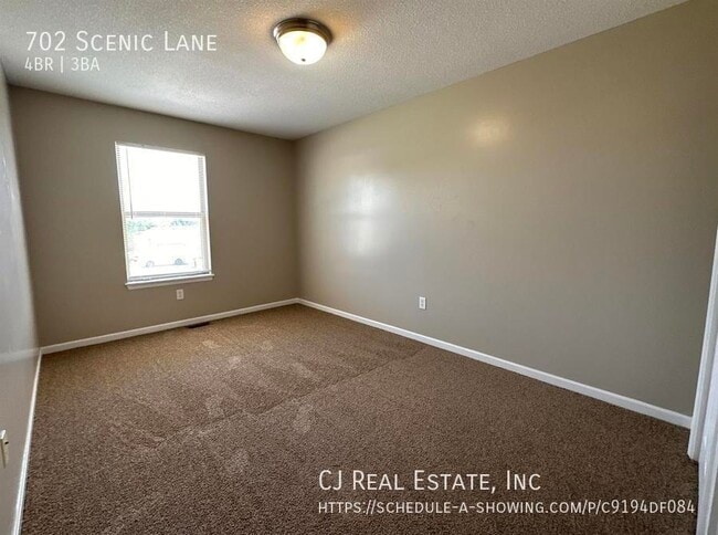 Building Photo - 702 NW Scenic Ln