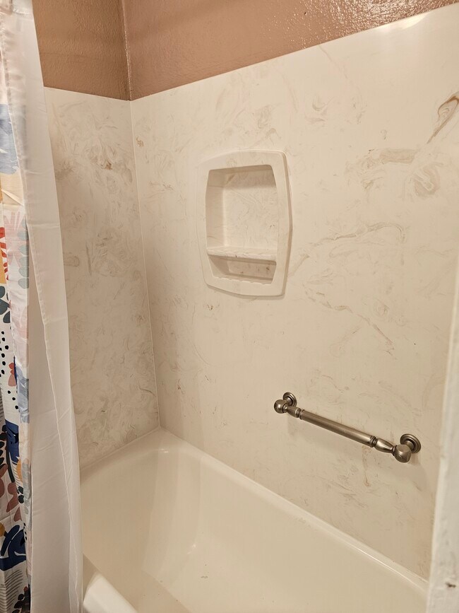 Marble shower wall - 10809 N Main St