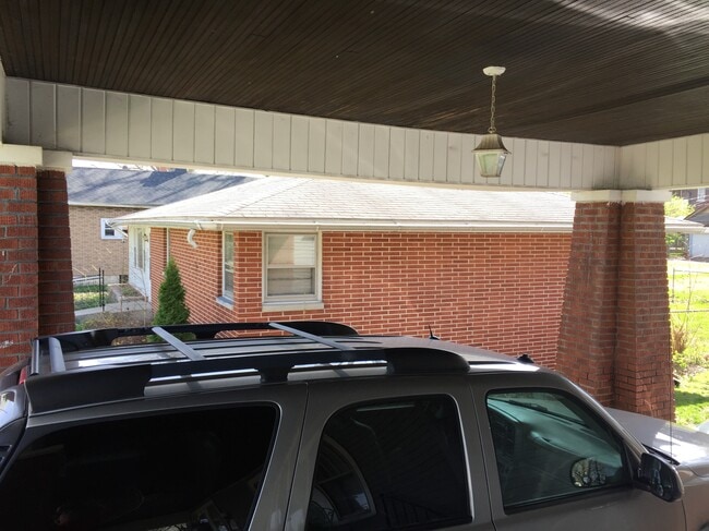 Covered Parking. There is a two-car garage as well. - 1425 South 7th Street