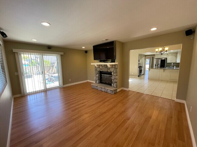 Additional family/entertainment center with another raised hearth fireplace - 26056 Bancroft St