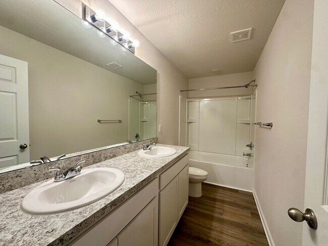 Building Photo - Practically New Townhome!
