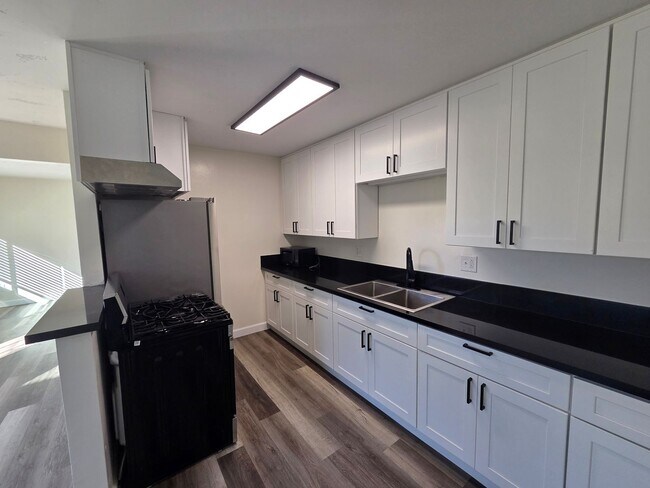 Building Photo - Two bedroom house for rent with garage