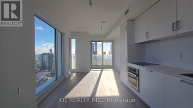 Building Photo - 88 Queen St E