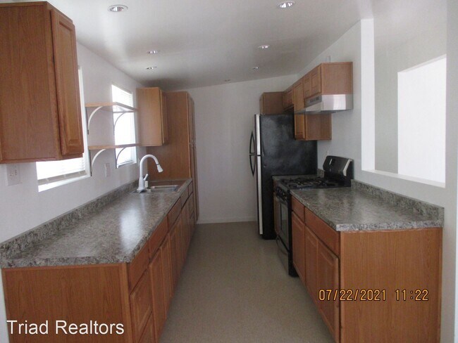 Building Photo - 3 br, 1 bath House - 5477 Baileya Ave.